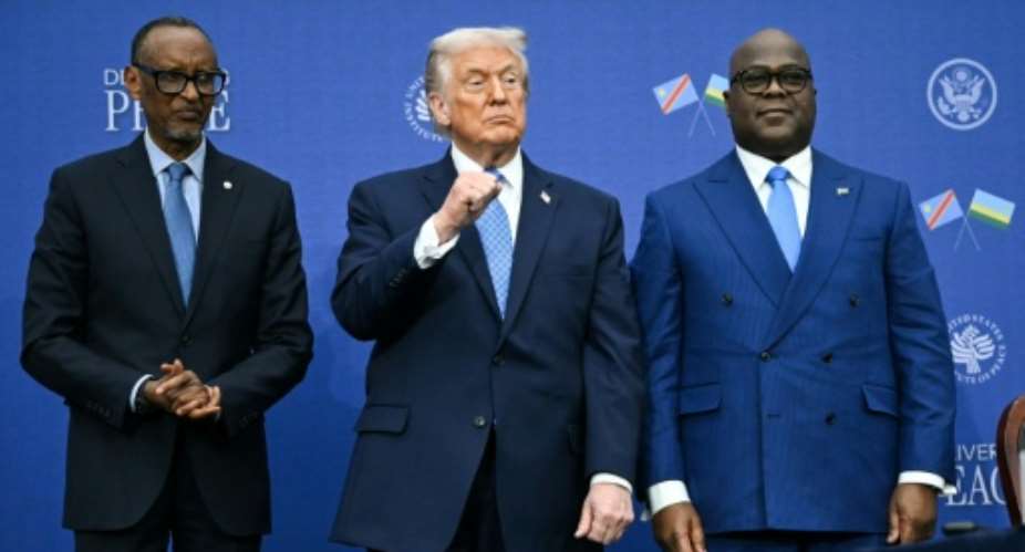 Donald Trump says the peace deal means everybodys going to make a lot of money -- but Rwandas Paul Kagame and DR Congos Felix Tshisekedi didnt shake on it.  By ANDREW CABALLERO-REYNOLDS (AFP)