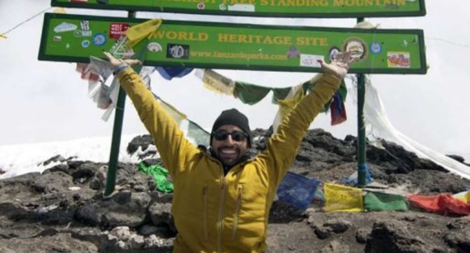 Double amputee Spencer West after ascending Mount Kilimanjaro.  By  AFPFree the Children