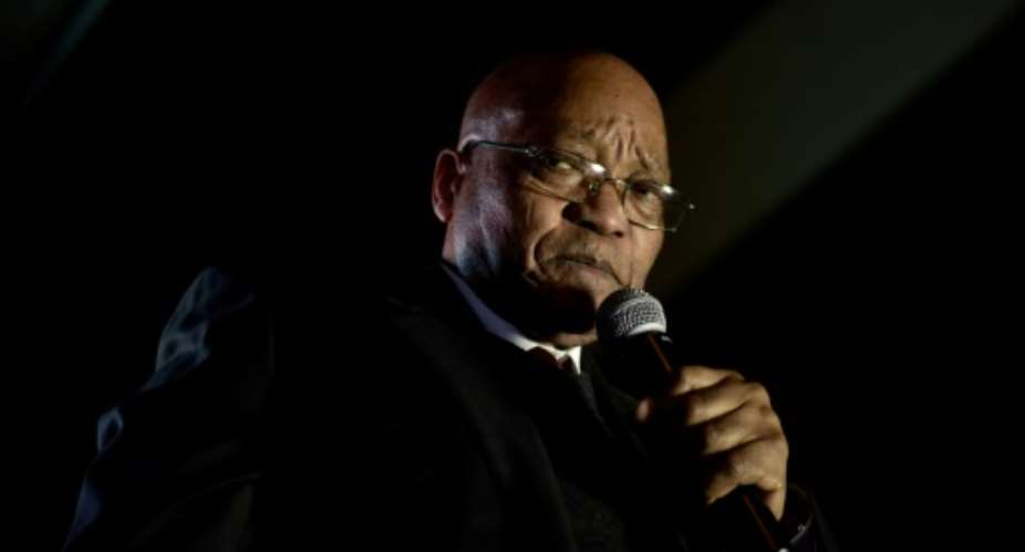 Down but not out -- yet: South Africa's embattled President Jacob Zuma has rejected a party request that he resign.  By PIETER BAUERMEISTER AFPFile