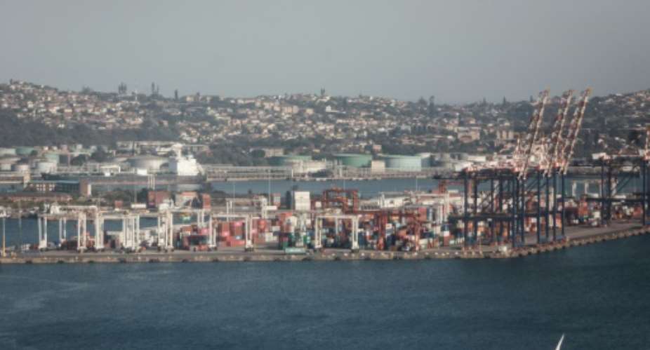 Dozens of container ships are stuck outside Durban port as bad weather and systems breakdowns hit its operations.  By RAJESH JANTILAL (AFP)