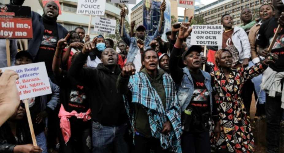 Dozens of families and activists protested during Ahmed Rashids arraignment in 2022.  By Tony KARUMBA (AFP/File)