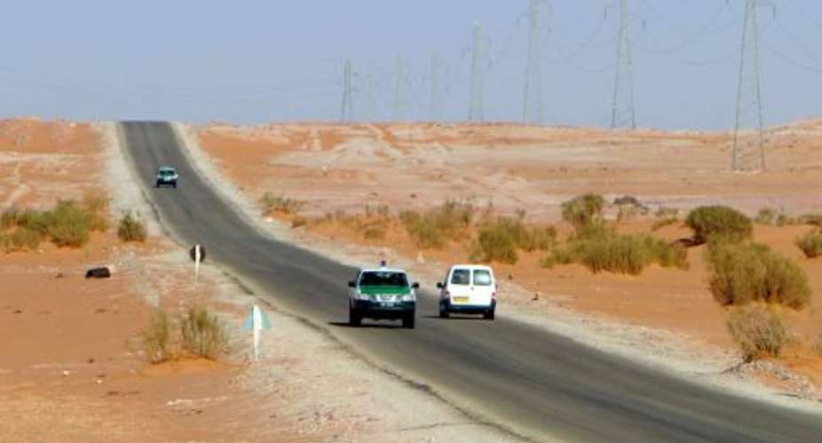 Algerian security forces patrol an area deep in the Sahara near the Libyan border on January 19, 2013.  By Farouk Batiche AFP