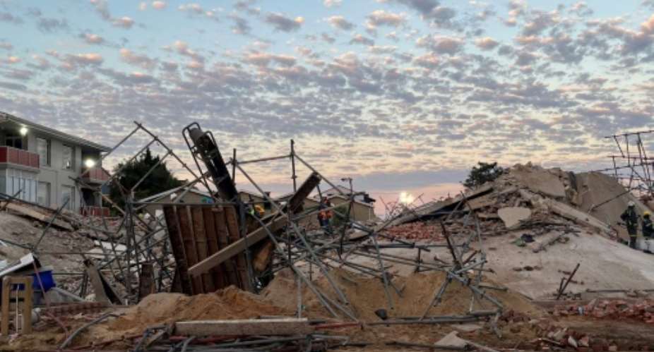 Dozens of people remain unaccounted for after a building collapsed on Monday in South Africa's southern city of George.  By Willie van Tonder AFPFile
