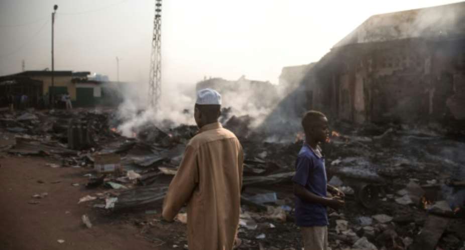 Dozens of stores have been burned down in Bangui's PK5 district, a flashpoint for violence in the Central African Republic.  By FLORENT VERGNES AFP