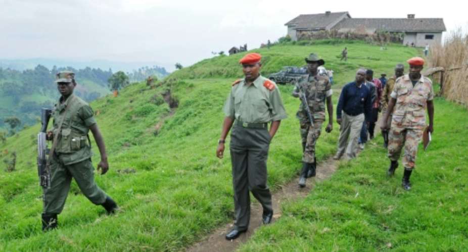 Then rebel general Bosco Ntaganda C inspects his mountain base in Kabati, north west of the provincial capital Goma,  Democratic Republic of Congo in 2009.  By Lionel Healing AFPFile