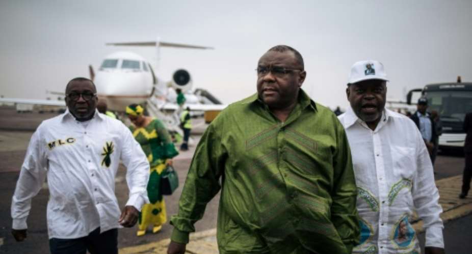 DR Congo opposition figure Jean-Pierre Bemba C made a low-key visit to the country.  By ALEXIS HUGUET AFP