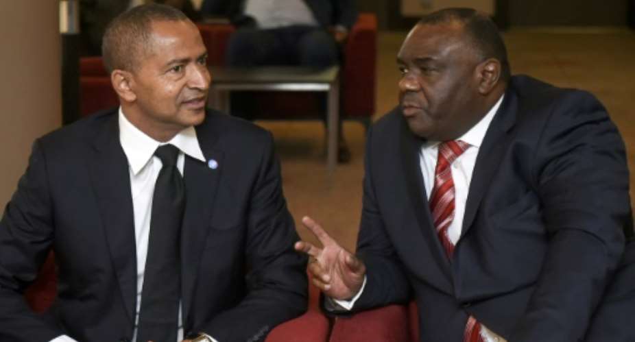 DR Congo opposition leaders Moses Katumbi, left, and Jean-Pierre Bemba in Brussels on Wednesday. Both have been ruled out of running for president in December elections.  By JOHN THYS AFP