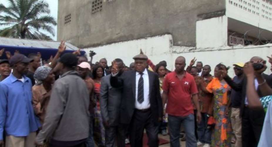 Veteran opposition leader Etienne Tshisekedi (C), is pictured with supporters in 2011.  By  (AFP/File)