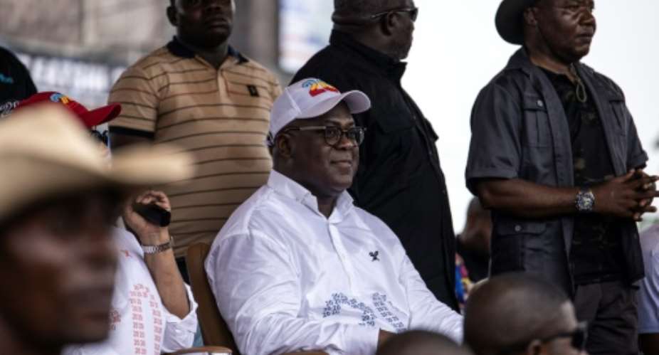 DR Congo President Felix Tshisekedi C officially swept the election to win a second term.  By JOHN WESSELS AFPFile