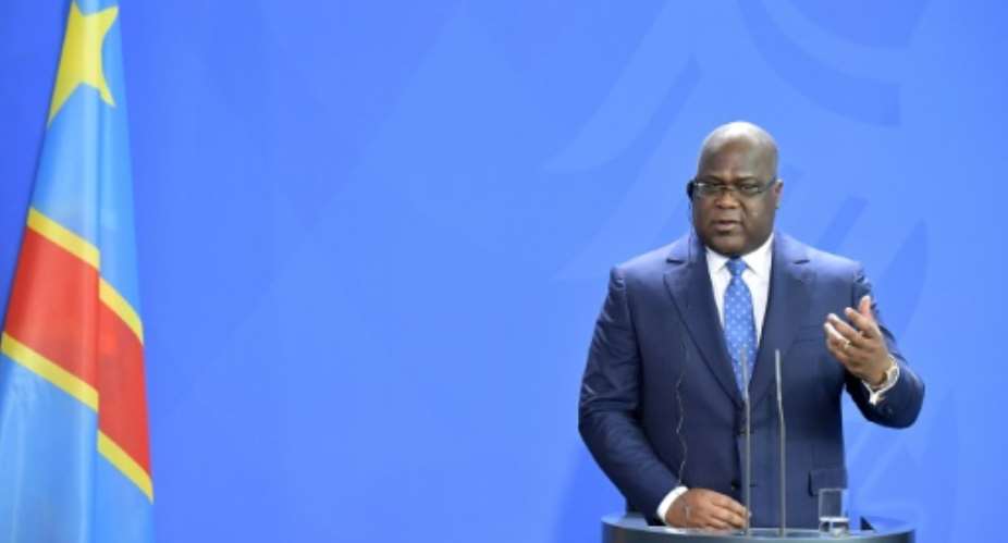 DR Congo President Felix Tshisekedi, pictured in November 2019, has vowed to enact sweeping reforms and root out corruption in the strife-torn country.  By Tobias SCHWARZ AFPFile