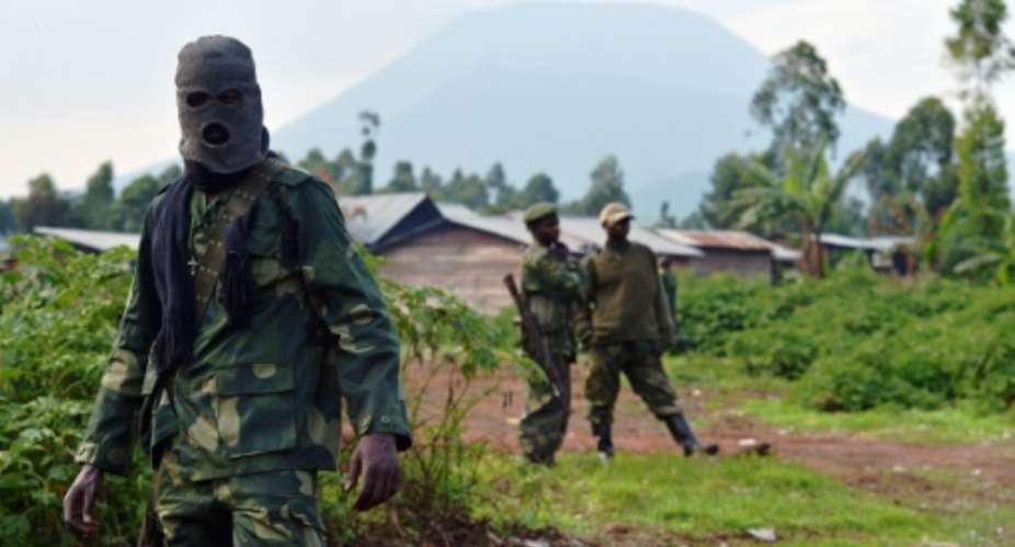 DR Congo security forces have been accused by the UN of using disproportionate force against militiamen, who are armed mainly with clubs and catapults.  By CARL DE SOUZA AFPFile
