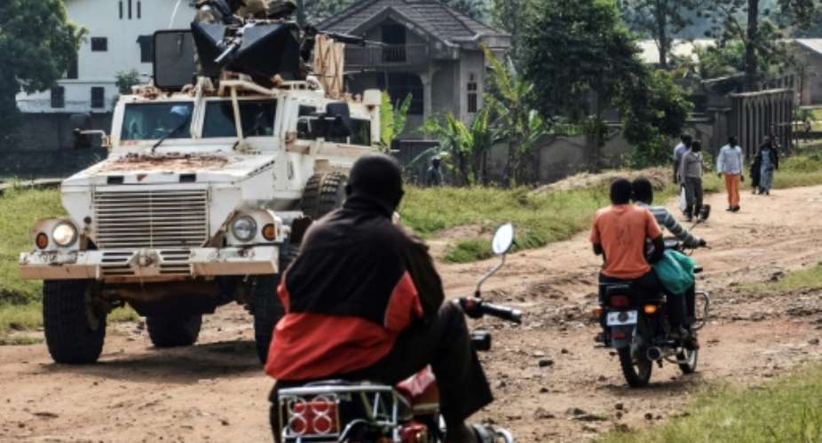 DR Congo's huge eastern region has long been wracked by violence, but fighting between government soldiers and militia groups, as well as inter-ethnic clashes, has increased since 2017.  By Alain WANDIMOYI AFPFile