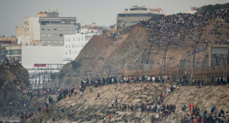 Dramatic images from the Spanish territory of Ceuta, on the Moroccan coast, are fueling far-right warnings over immigration.  By Jorge GUERRERO (AFP)