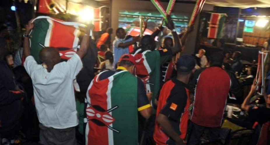 Kenyan rugby fans cheer-on their national sevens team on May 23, 2009 in Nairobi.  By Tony Karumba AFPFile