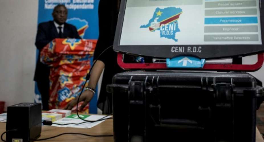 DRCongo wants to use touch screen voting machines but some say this will pave the way for fraud.  By John WESSELS AFPFile