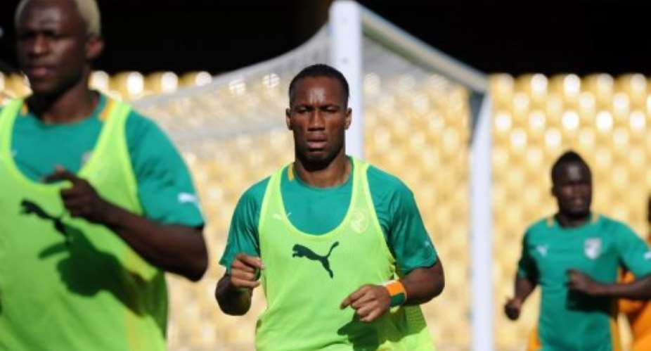 Didier Drogba C trains with his Ivory Coast teammates in Rustenburg, South Africa on January 21, 2013.  By Alexander Joe AFP