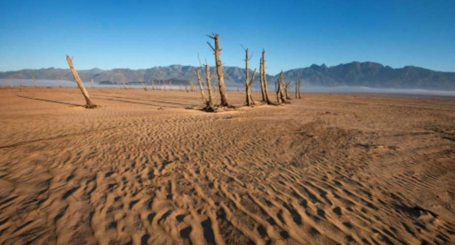 Drought has left  Theewaterskloof Dam, some 100 kms from Cape Town, at less than 20 percent of water capacity.  By Rodger BOSCH AFP