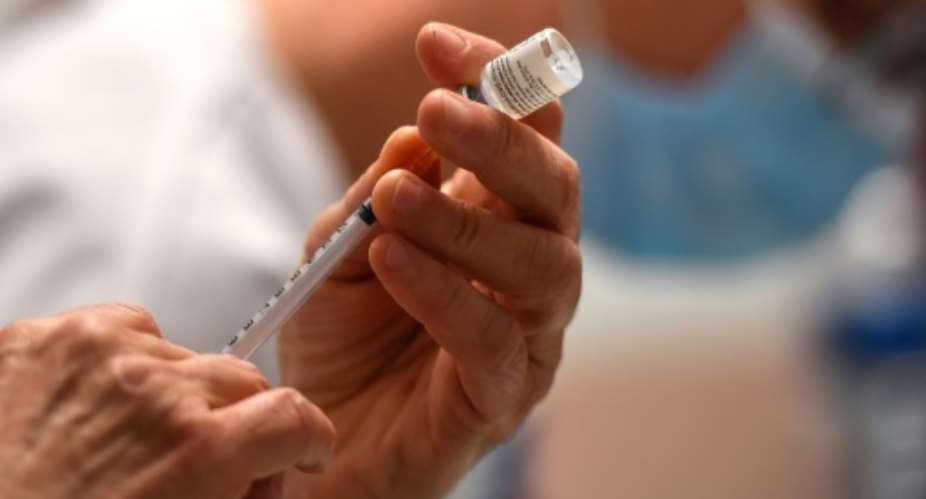 Drugmakers worldwide defied predictions by finalising not just one SARS-CoV-2 vaccine in record time, but half a dozen.  By Pascal GUYOT (AFP/File)