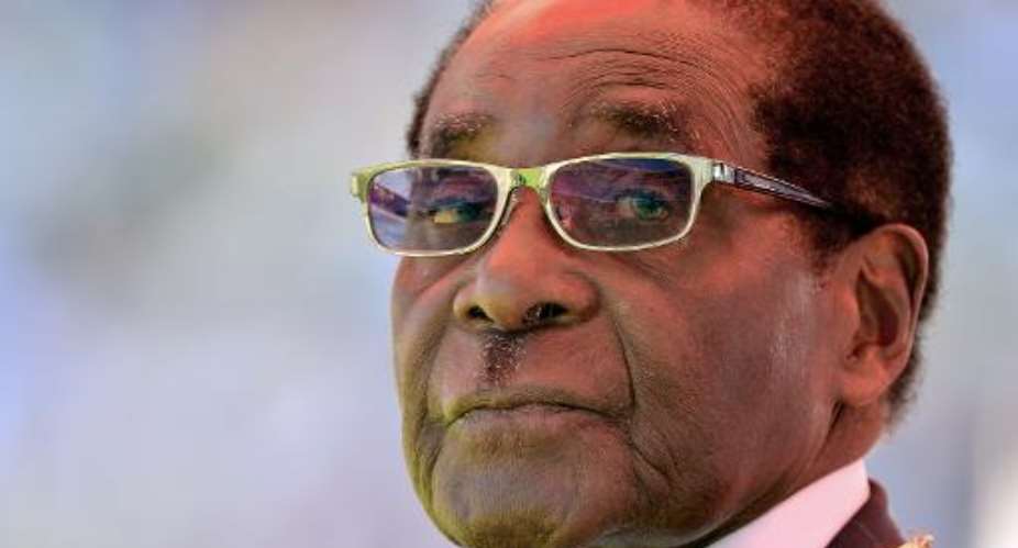 Zimbabwean President Robert Mugabe, seen during his inauguration and swearing-in ceremony on August 22, 2013 in Harare.  By Alexander Joe AFPFile