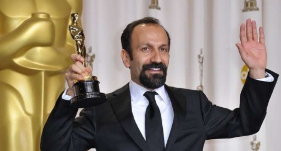 The director of A Separation, Asghar Farhadi, poses with his Oscar in the press room at the 84th Annual Academy Awards.  By Joe Klamar AFPFile