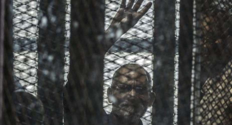 Egypt court commutes Brotherhood leader's death sentence