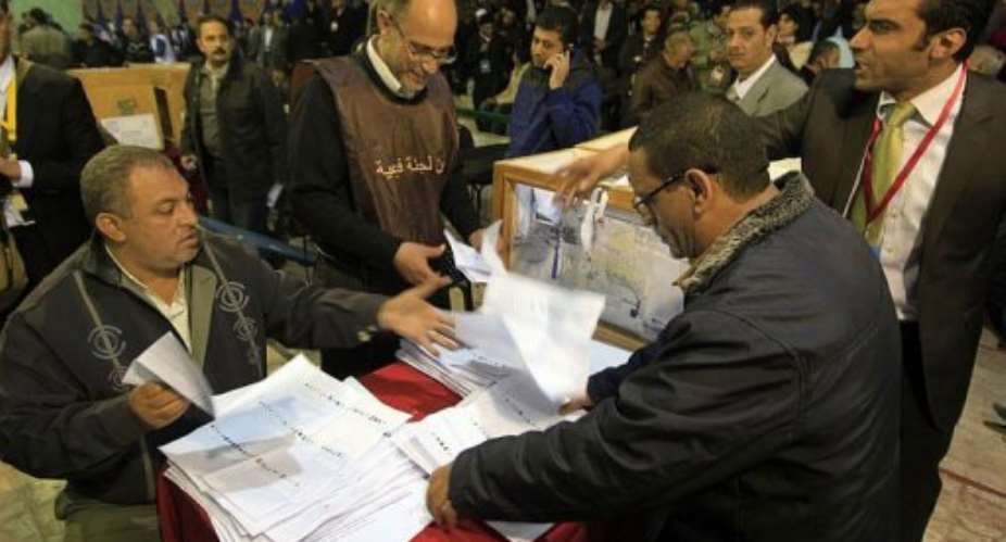 Egyptian election officials count ballots at the end of the second voting day.  By Mahmud Hams AFPFile