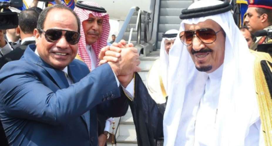 Egyptian President Abdel Fattah al-Sisi left sparked protests after he handed over two islands to Riyadh after trade talks with Saudi King Salman in April 2016.  By  Egyptian PresidencyAFPFile