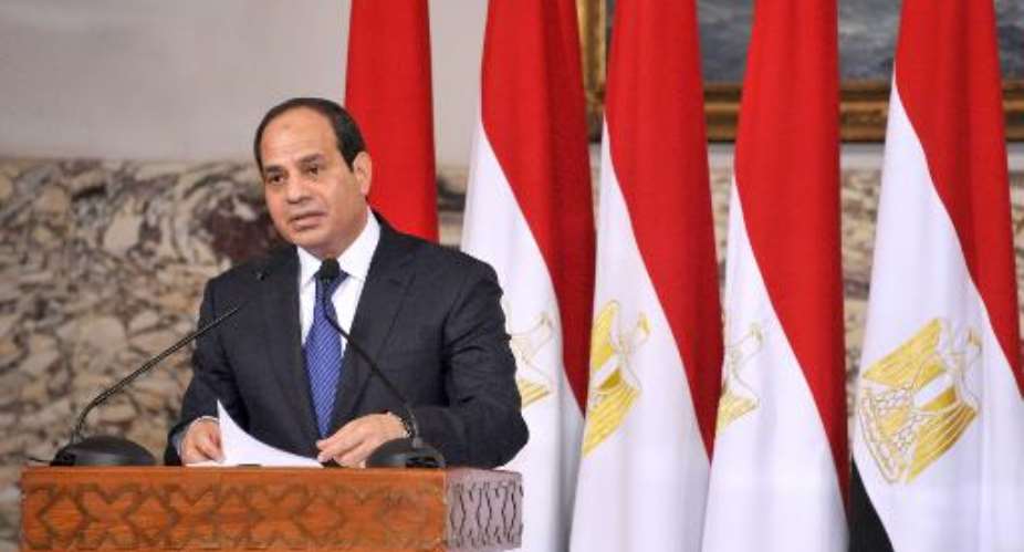 Egypt's President elect Abdel Fattah al-Sisi delivering a speech after signing the handing over of power document in Cairo on Jun 8, 2014.  By - Egyptian PresidencyAFP