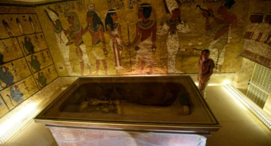 The golden sarcophagus of King Tutankhamun displayed in his burial chamber in the Valley of the Kings, close to Luxor, 500 kms south of the Egyptian capital Cairo on April 1, 2016.  By Mohamed El-Shahed AFP