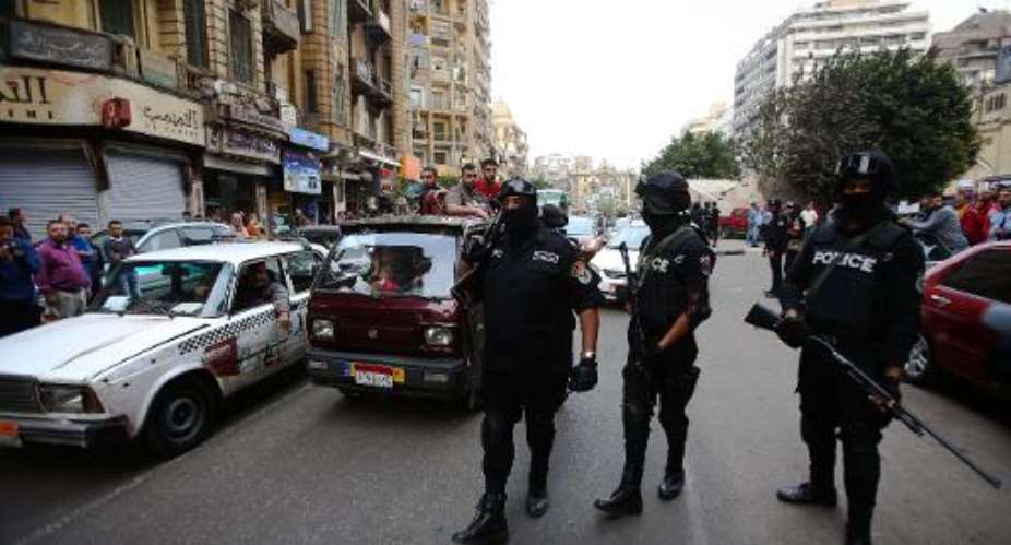 Police monitor a street in Cairo during an anti-military demonstration earlier this month.  By Mohamed El-Shahed AFPFile