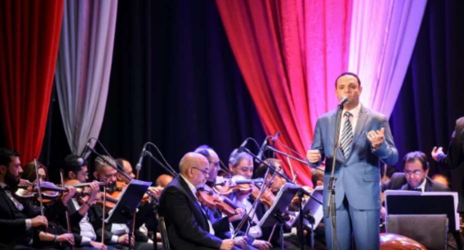 Egyptian classical Arabic music singer Ahmad Adel performs a song by celebrated 20th century Egyptian composer Mohamed Abdel Wahab, at the Arab Music Institute Theatre.  By Mohamed el-Shahed AFP