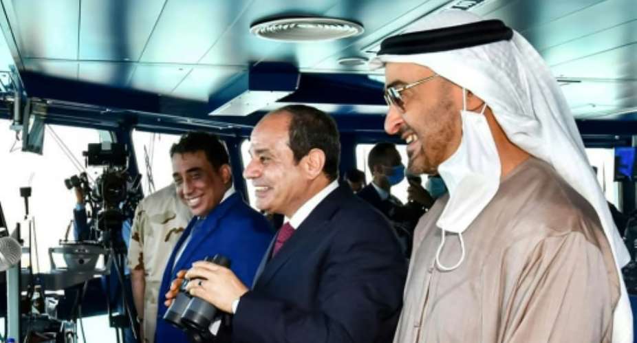Egyptian President Abdel Fattah al-Sisi Cinaugurates a new naval base on the Mediterranean Sea flanked by Abu Dhabi Crown Prince Sheikh Mohammed bin Zayed Al-Nahyan R.  By - EGYPTIAN PRESIDENCYAFP