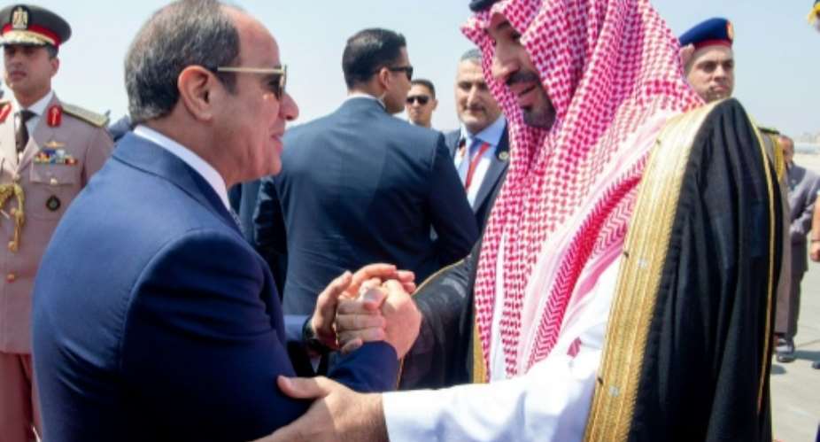 Egyptian President Abdel Fattah al-Sisi met the Saudi de facto ruler Crown Prince Mohammed bin Salman in Cairo.  By Ahmed NURELDINE (SPA/AFP)