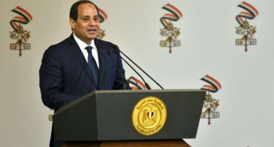 Egyptian President Abdel Fattah al-Sisi, pictured in April 2017, ratified a law that heavily regulates NGOs.  By Andreas SOLARO AFPFile