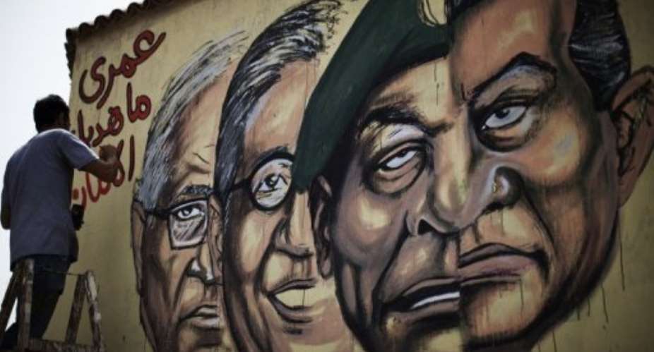 The election caps a rollercoaster transition, marked by political upheaval and bloodshed.  By Marco Longari (AFP)