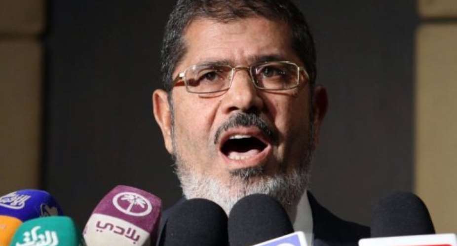 Muslim Brotherhood presidential candidate Mohamed Morsi said the Brotherhood wants neither confrontation nor violence.  By  AFP