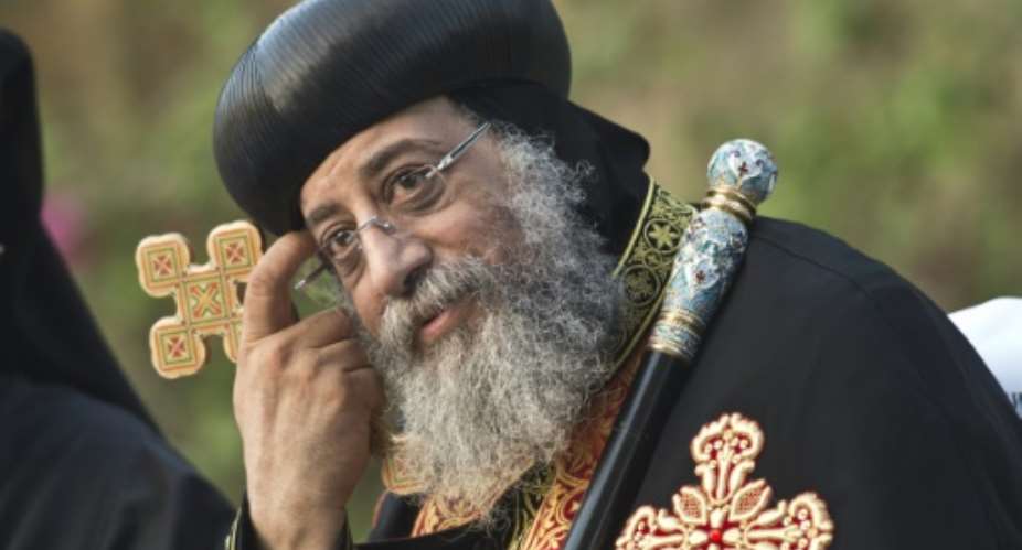 Egypt's Coptic Church head Pope Tawadros II cancelled a meeting with US Vice President Mike Pence in Cairo later this month in protest at Washington's decision to recognise Jerusalem as Israel's capital, the church said.  By KHALED DESOUKI AFPFile