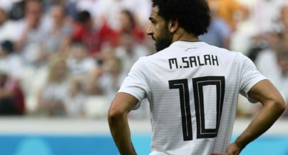 Egypt's forward Mohamed Salah looks on during the Russia 2018 World Cup Group A football match between Saudi Arabia and Egypt at the Volgograd Arena in Volgograd on June 25, 2018.  By NICOLAS ASFOURI AFP