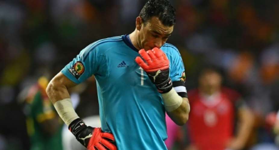 Egypt's goalkeeper Essam El-Hadary reacts after his side's 2-1 defeat to Cameroon in the 2017 Africa Cup of Nations final at the Stade de l'Amitie Sino-Gabonaise in Libreville on February 5, 2017.  By Gabriel BOUYS AFP