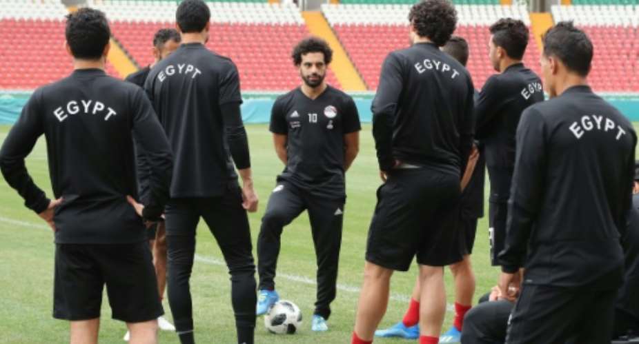 Egypt's Mohamed Salah C missed his team's defeat to Uruguay as he struggles to recover from the shoulder injury sustained during last month's Champions League Final.  By KARIM JAAFAR AFP