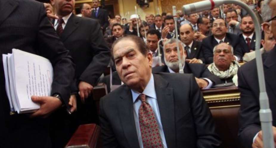 The Muslim Brotherhood wants the military junta to sack Prime Minister Kamal al-Ganzuris government.  By  (AFP/File)