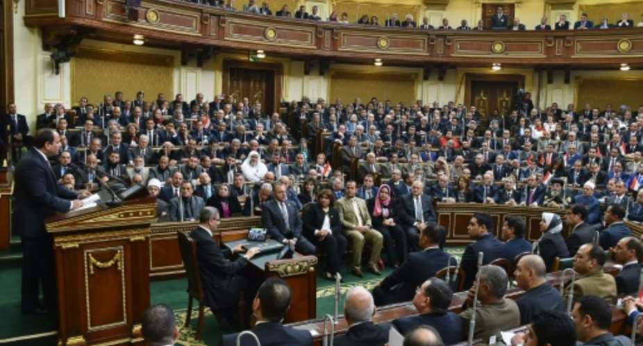 Egypt's parliament passed a hard-fought civil service law last week in a rare outbreak of resistance to President Abdel Fattah al-Sisi, seen here addressing the lawmakers earlier this year.  By  Egyptian PresidencyAFPFile