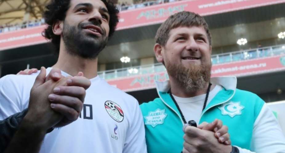 Egypt's star striker Mohamed Salah L poses with head of the Chechen Republic Ramzan Kadyrov in Grozny on June 10, 2018.  By KARIM JAAFAR AFPFile