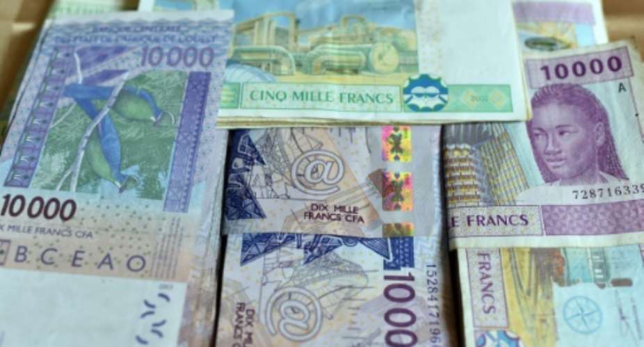 Eight countries in West Africa use the CFA franc. Six other countries use a Central African version of the French-backed currency..  By ISSOUF SANOGO AFP