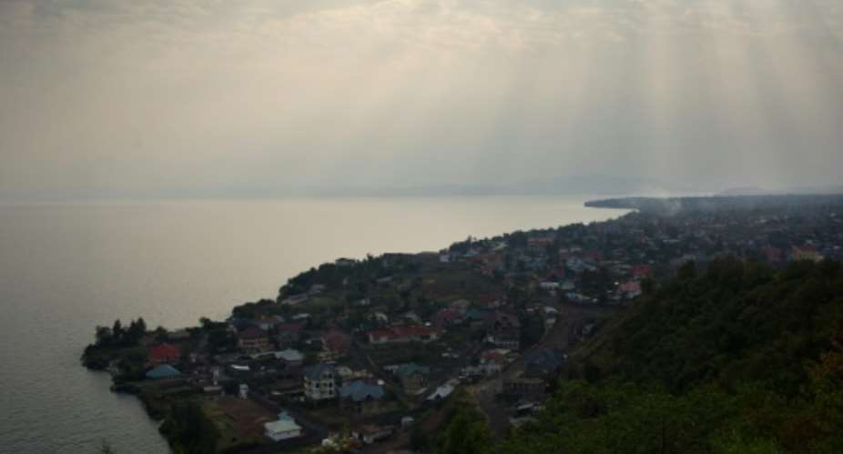A view over Lake Kivu and Goma, the capital of North Kivu province in the east of the Democratic Republic of the Congo, is seen on August 1, 2013.  By Phil Moore AFPFile