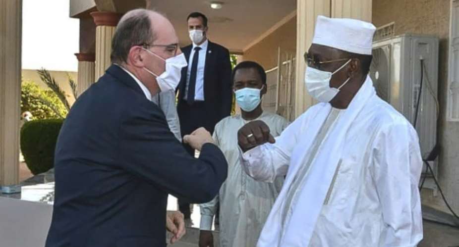 Elbow greeting: French Prime Minister Jean Castex, left, and Chadian President Idriss Deby Itno.  By - AFP