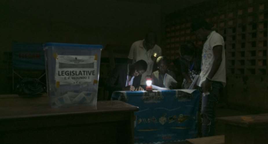 Electoral officials count votes after the February 2020 general and municipal elections in Yaounde, Cameroon.  By - AFPFile