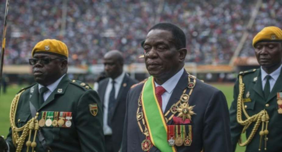 Emmerson Mnangagwa was sworn in as president of Zimbabwe less than three weeks after being sacked by ousted leader Robert Mugabe.  By MUJAHID SAFODIEN AFP