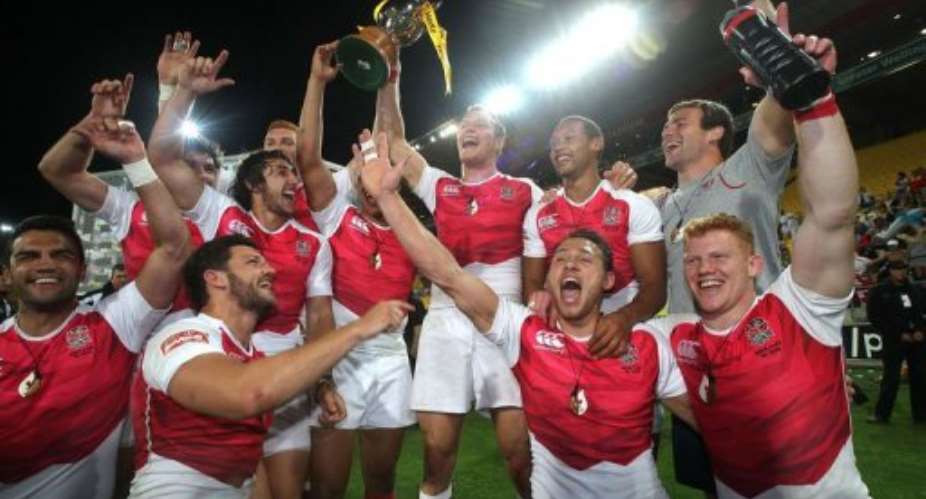 England celebrate winning the cup final at the IRB Rugby Sevens World Series in Wellington on February 2, 2013.  By Marty Melville AFP