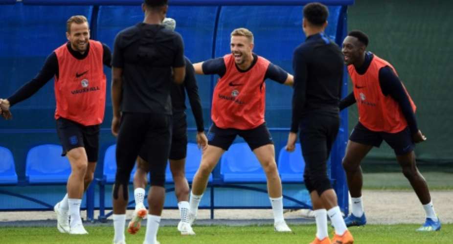 England captain Harry Kane L, who is yet to score a goal in a tournament, has vowed an aggressive approach against opponents expected to defend in numbers.  By PAUL ELLIS AFP